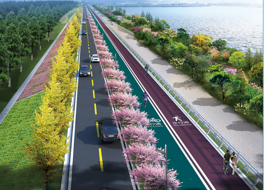 交通产业集团负责建设的沿江生态景观带堤顶路工程快速推进